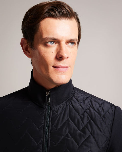 HAMSTE-Tops-Wrapping up never looked better. The HAMSTE jacket features a quilted front and funnel neck to keep out the breeze. Ideal for crisp morning walks and after work pints. Jacket Chevron quilted front Long sleeves Zip fastening Funnel neck Pockets Lewis is 6'2" / 1.88m and wears Navy in a Ted size 3- Ted Baker Romania